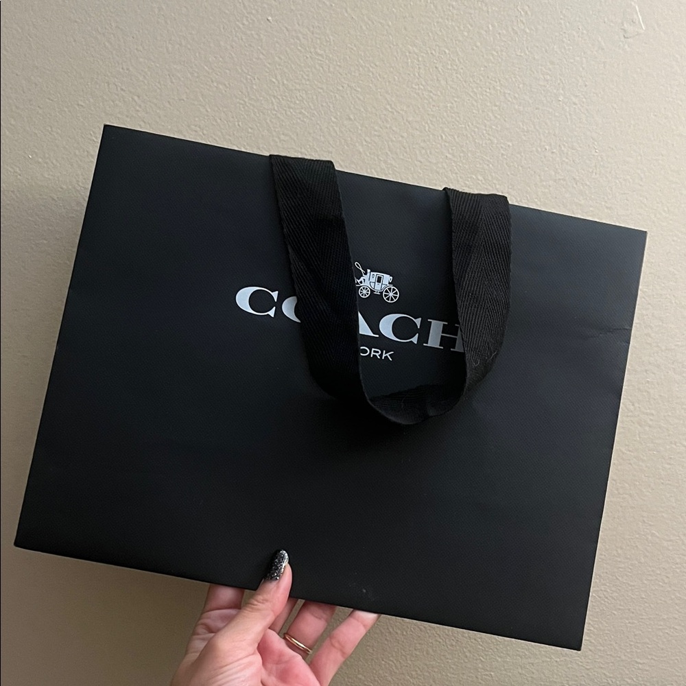 Coach black paper bag